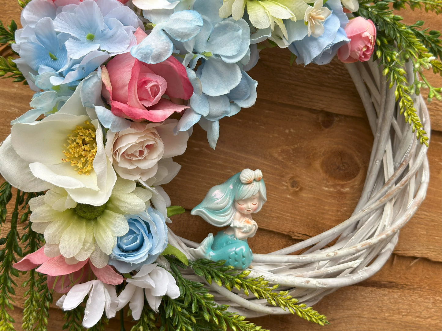 Handmade Sea Breeze Mermaid Wreath featuring a unique mermaid figurine and artificial flowers, perfect for coastal summer decor.