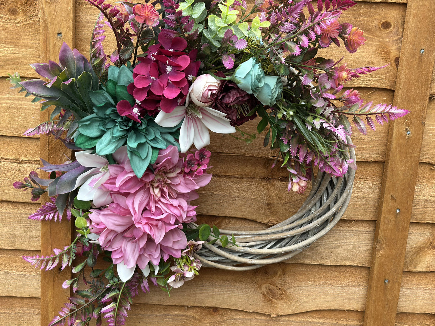 30 cm handmade floral wreath in vibrant pink, teal, and purple hues, perfect for UK home decoration