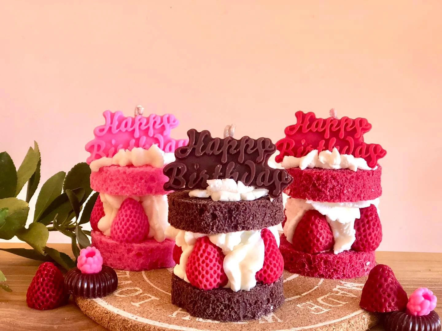 Handmade birthday cake candle with realistic whipped cream, berries, and 'Happy Birthday' topper β a perfect gift or party decoration, made from soy wax.