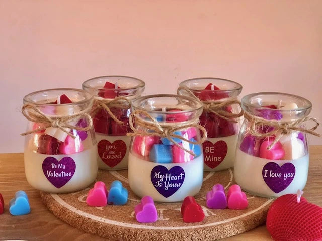 Handmade Valentine’s Day jar candle with heart-shaped wax melts, twine decoration, and romantic message – a perfect scented gift for anniversaries and special occasions