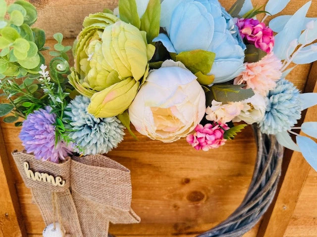 Unique coastal-themed wreath bringing fresh and cheerful summer vibes.