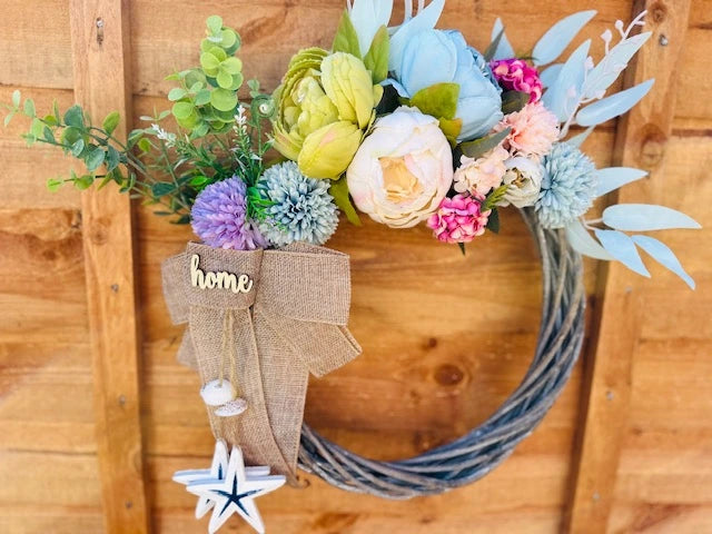 Unique coastal-themed wreath bringing fresh and cheerful summer vibes.